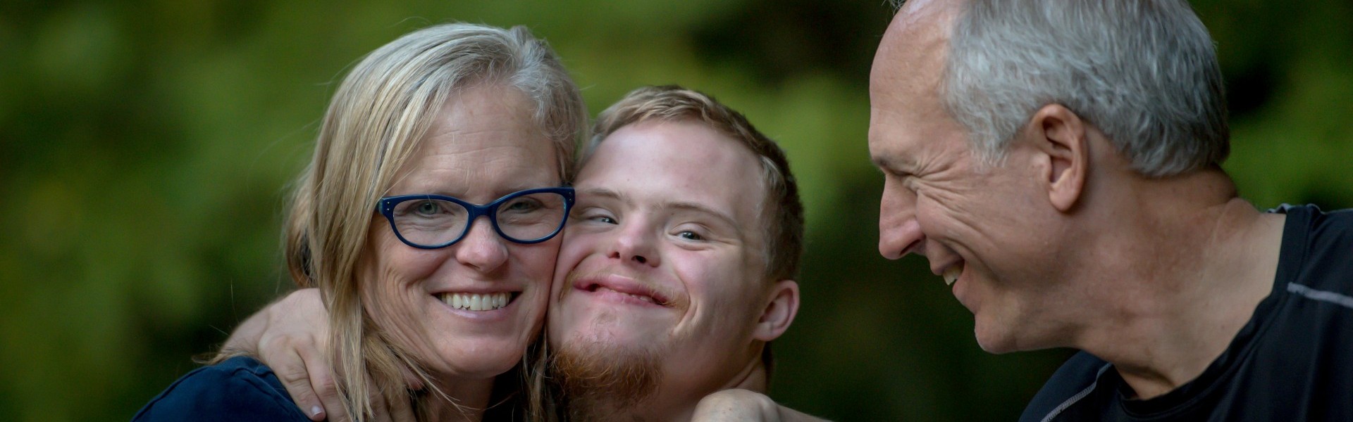 Large picture of a family hugging